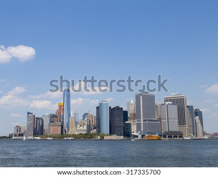 Skyline of lower Manhattan NYC photographed from water. Photographed in Aug 2015.