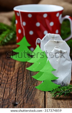 Tea bag with Christmas tree label . Selective focus