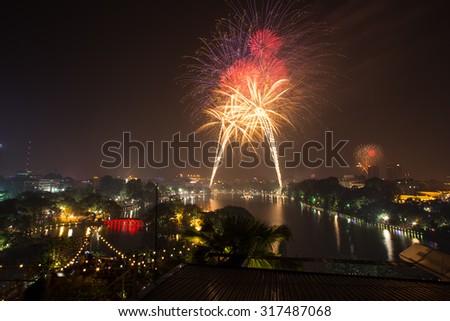 Firework on Hanoi liberation 60th day at Hoan Kiem lake, Hanoi, Vietnam