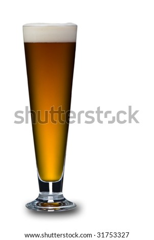 A close up of a single glass of beer on a white background. Beer is a lovely golden colour with white frothy bubbles on top.