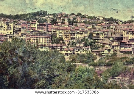 Veliko Tarnovo in Bulgaria. Grungy old postcard style.