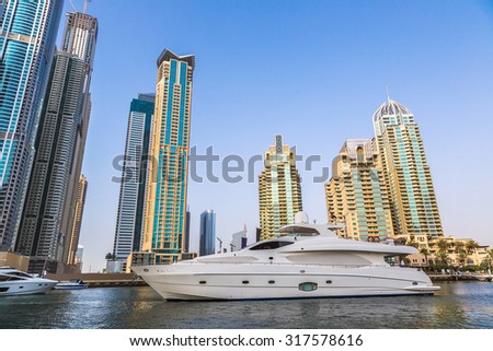 Modern buildings in Dubai Marina, Dubai, UAE in a summer day Royalty-Free Stock Photo #317578616