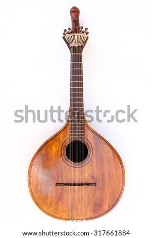 Portuguese guitar,  with tradicional fan (or peachow, watchkey) tuners - white background Royalty-Free Stock Photo #317661884