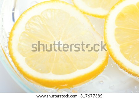 slieces of lemon Royalty-Free Stock Photo #317677385