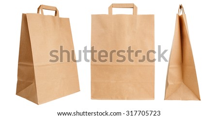 Various kraft paper bags isolated on white background Royalty-Free Stock Photo #317705723