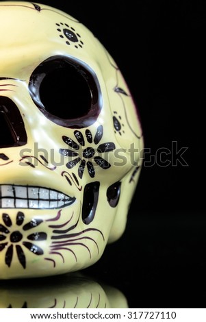 Painted for the Day of the Dead skull (Mexican tradition)
