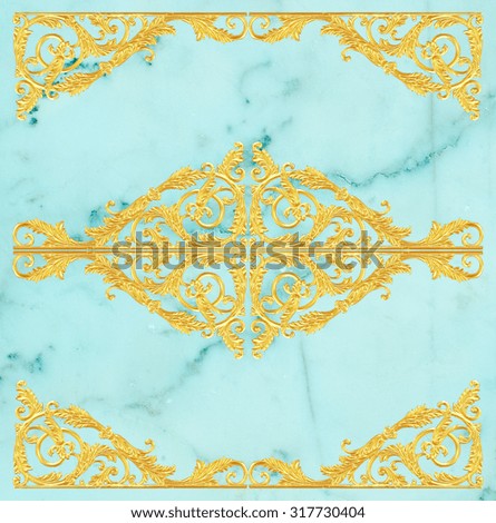 Ornament elements, vintage gold floral designs on a marble background.