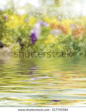 Beautiful surface rippled of water and blur nature background