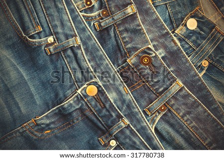 style blue jeans in the store shelf. close up.  instagram image filter retro style