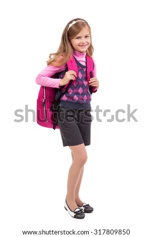 school girl with a backpack on a white background smiling, picture with depth of field and artistic blur