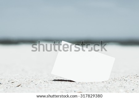 Retro Photo Of White Blank Instant Photo Card On Beach Sand In Summer