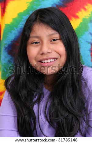 one young ethnic mayan girl with long black hair over a very colorful background