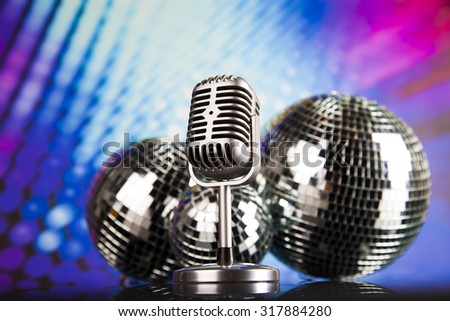 Retro style microphone on sound waves and Disco Balls