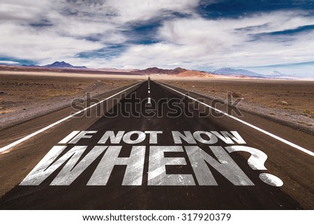 If Not Now When? written on desert road Royalty-Free Stock Photo #317920379