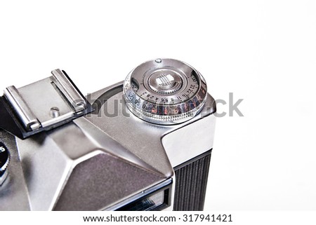 Range finder camera with lens. Close up view part of old retro camera. Classic black manual film camera isolated on white background.
