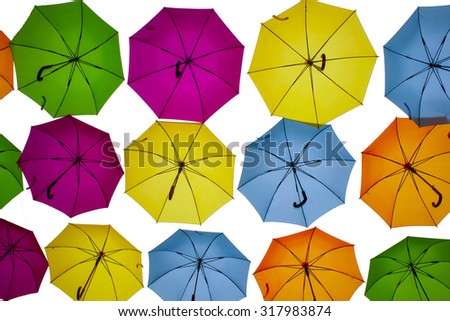colored umbrellas in the air