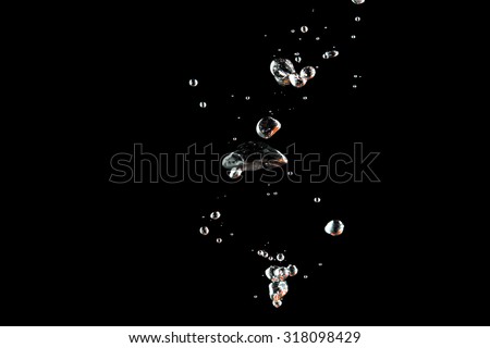 Bubbles water at black background
