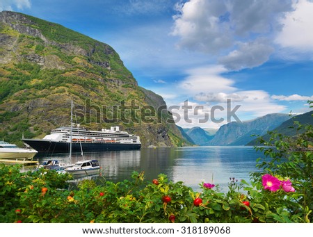 Landscape with cruise ship at Sognefjord in Norway Royalty-Free Stock Photo #318189068