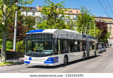 Trolleybus on a street of Lausanne - Switzerland Royalty-Free Stock Photo #318196490