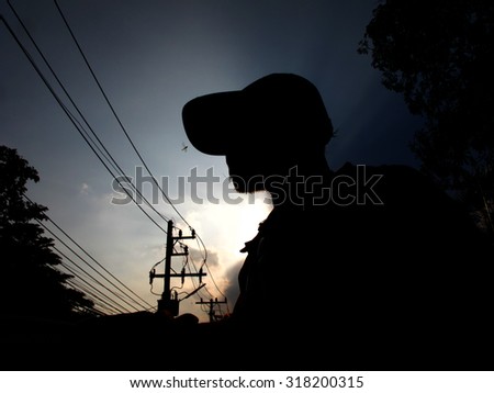 the shadow man and the light of blue sky