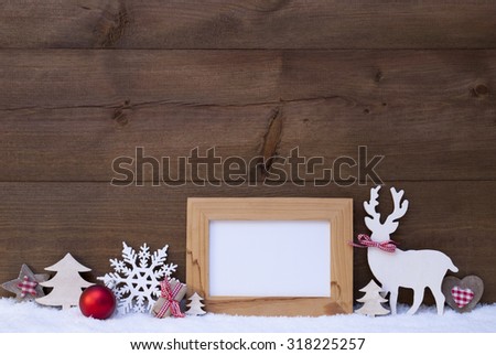 Christmas Decoration With Empty Blank Picture Frame Reindeer Christmas Trees Snowflake Red Ball On Snow. Christmas Card For Seasons Greetings. Copy Space Free Text For Advertisement. Wooden Background