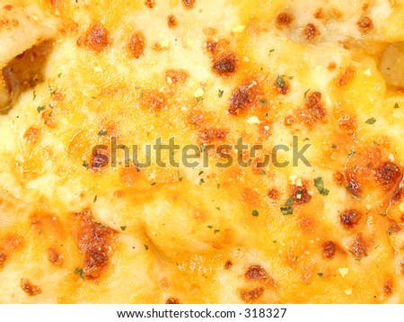 Close-up detail of cheese pizza.  Nice detail.