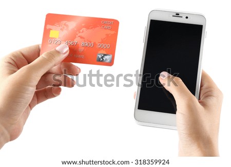 Female hands holding smartphone and credit card, isolated on white