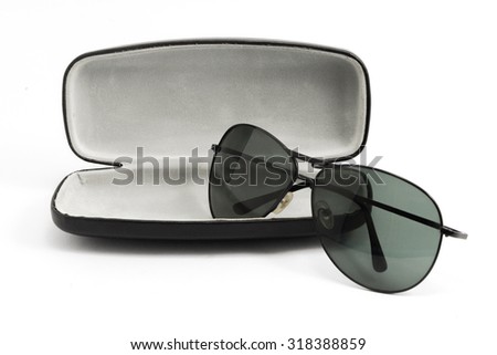 sunglasses in black opened case isolated on white background Royalty-Free Stock Photo #318388859