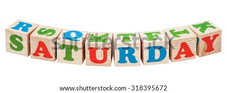 Wooden cubes. Days of the week. Saturday word isolated on a white background
