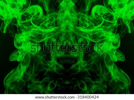 Beautiful art of green smoke abstract background. darkness concpet