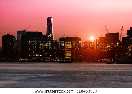 New York sunset over the East River with One World Trade Center