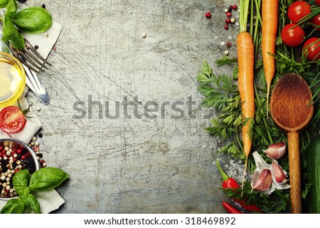 Wooden spoon and ingredients on old background. Vegetarian food, health or cooking concept. Royalty-Free Stock Photo #318469892