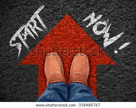 Inspiration quote : " Start now" on aerial view of shoe on road with move forward blue arrow ,Motivational typographic.