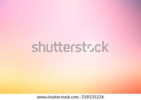 abstract blur colorful of pink and yellow gradient background for design work concept.