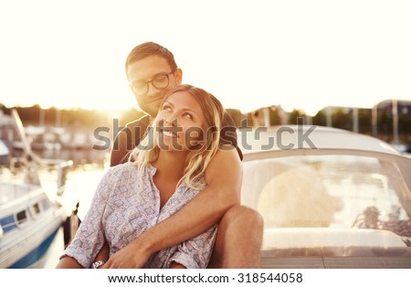Happy Couple On a Boat, Enjoying Life while In Love Royalty-Free Stock Photo #318544058