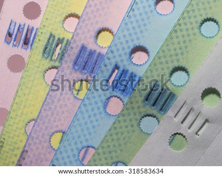 Stock Photo : Gibb or Holes beside the continuous paper, Several Colors of Carbonless paper, Carbonless Continuous Paper