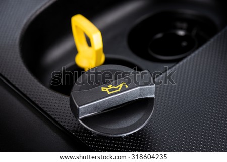 closeup engine oil cap in engine room Royalty-Free Stock Photo #318604235