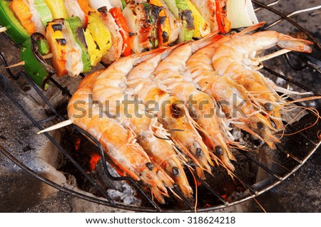 Grilled meat, shrimps and vegetables, barbecue grill food