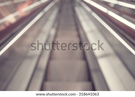 Abstract background of escalator at office interior , shallow depth of focus.
