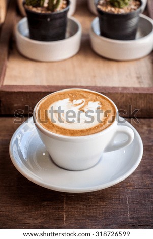 cappuccino coffee on wood table