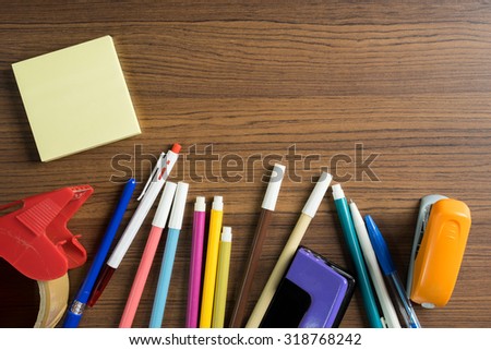 office or education equipment for student top view on wood background still life style