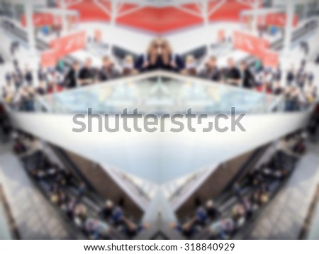 Abstract geometric background with people silhouettes, intentionally blurred post production.