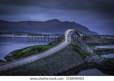 The Ocean road, Norway, during evening, with a cloudy sky. Royalty-Free Stock Photo #318848483