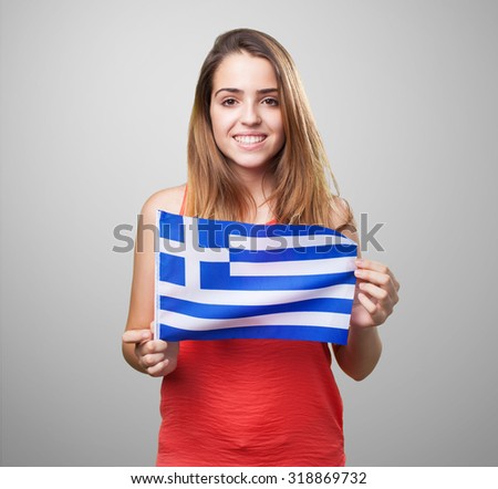 young woman holding a greece flag on white