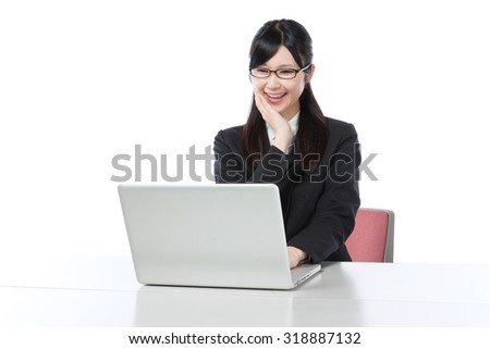 Women to work on a laptop , businesswoman ,Happy , joy , good luck