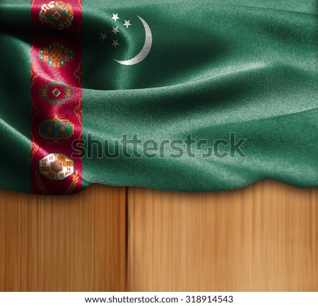 Turkmenistan flag on wood Texture