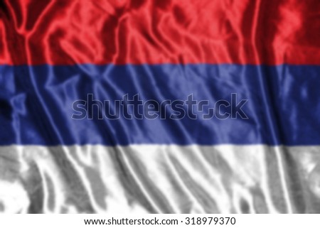 serbia flag,abstract blurred background
