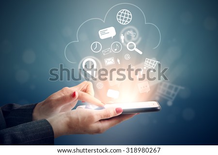 woman uploading her data at cloud storage Royalty-Free Stock Photo #318980267