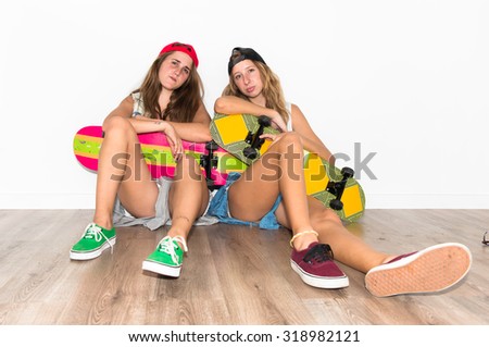 Friends with their skateboards