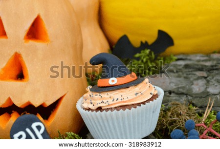 Happy Halloween Cupcakes.Halloween cookies.Composition for Halloween with sweets 